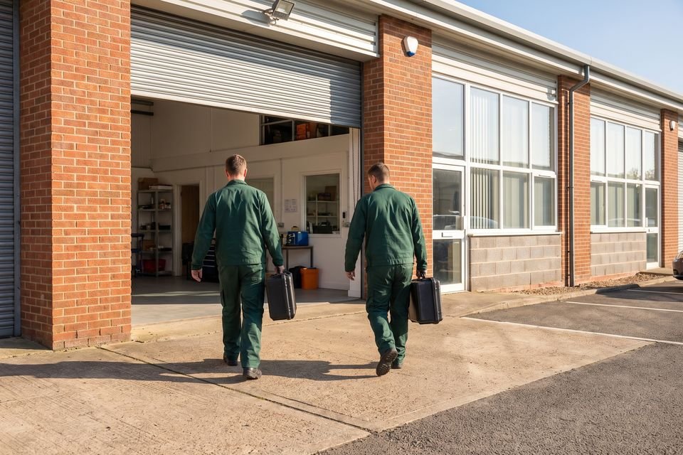 Team of pest control technicians in professional workwear